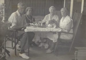 Four people seated at a table