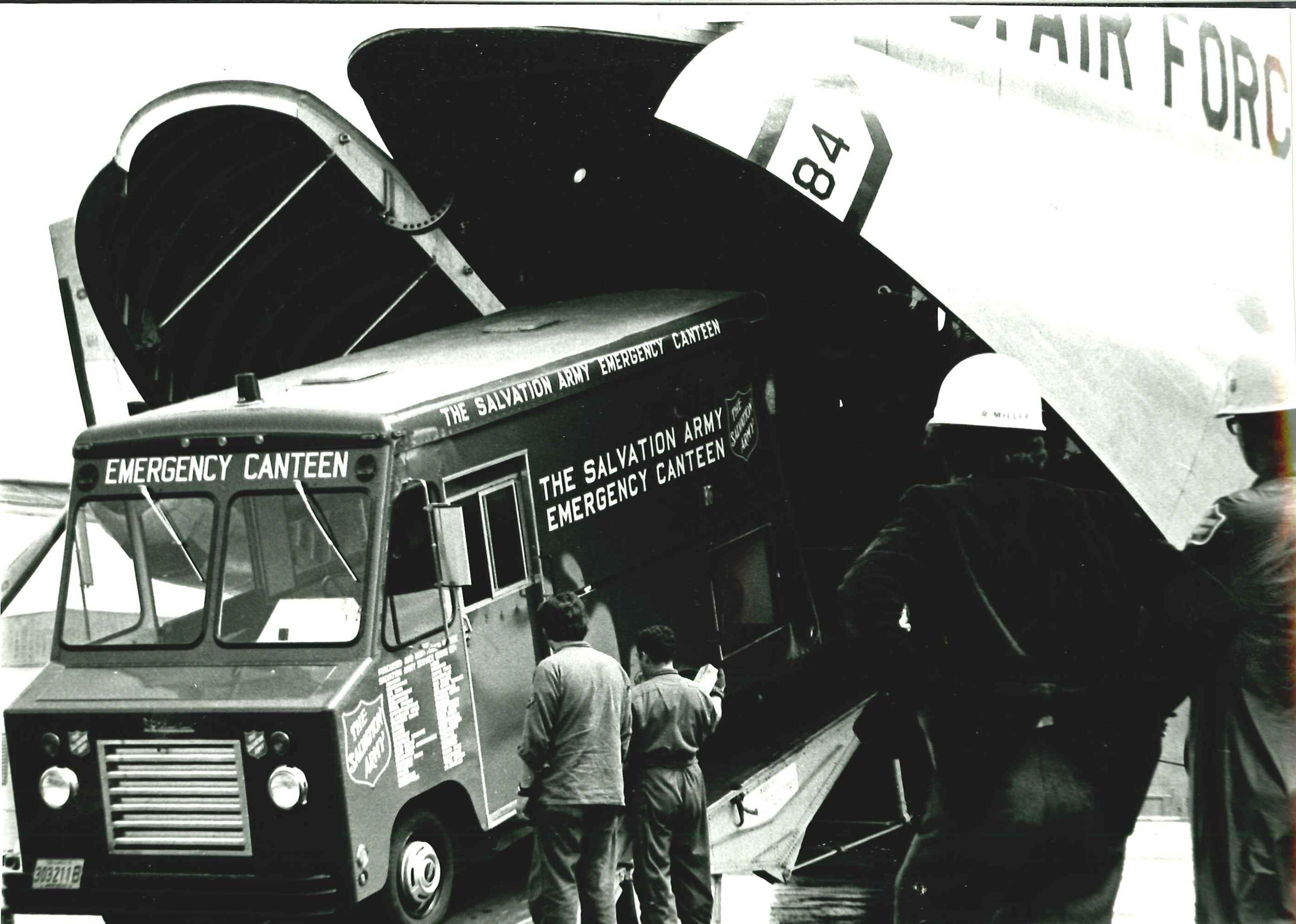 A Salvation Army canteen vehicle shown coming off of a United States Air Force cargo plane.