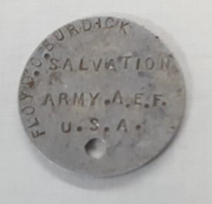 A medal disc shaped identification tag