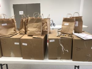 Boxes and bags sitting on a table