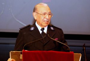 Raul Guerrero speaking at a podium.