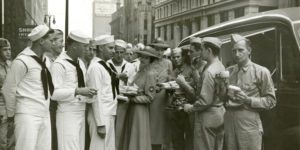 Adjutant Helen McClellen and Miss Betty Tenney serving servicemen from mobile unit photographed September 10 1942