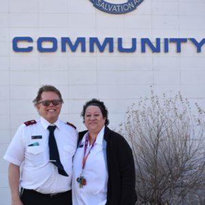 Photograph showing a man and woman wearing Salvation Army officer uniforms.